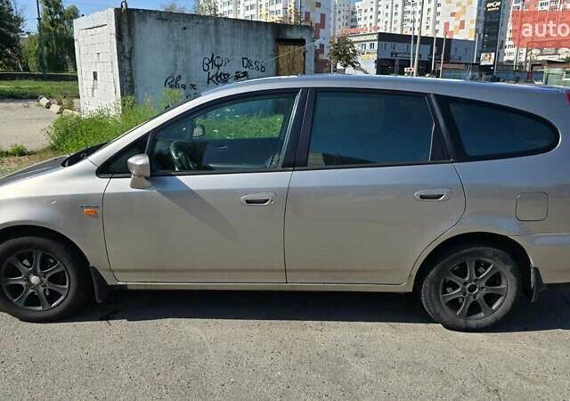 Бежевый Хонда Стрим, объемом двигателя 2 л и пробегом 240 тыс. км за 5500 $, фото 1 на Automoto.ua