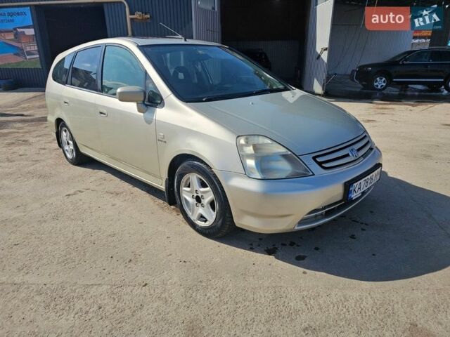 Бежевый Хонда Стрим, объемом двигателя 2 л и пробегом 451 тыс. км за 3750 $, фото 1 на Automoto.ua