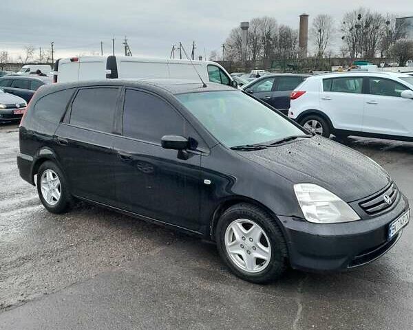 Чорний Хонда Стрім, об'ємом двигуна 2 л та пробігом 292 тис. км за 4500 $, фото 1 на Automoto.ua