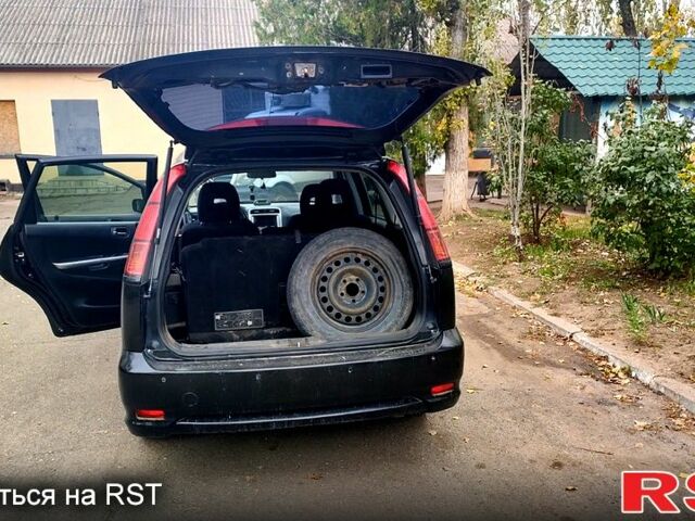 Черный Хонда Стрим, объемом двигателя 2 л и пробегом 265 тыс. км за 2900 $, фото 1 на Automoto.ua