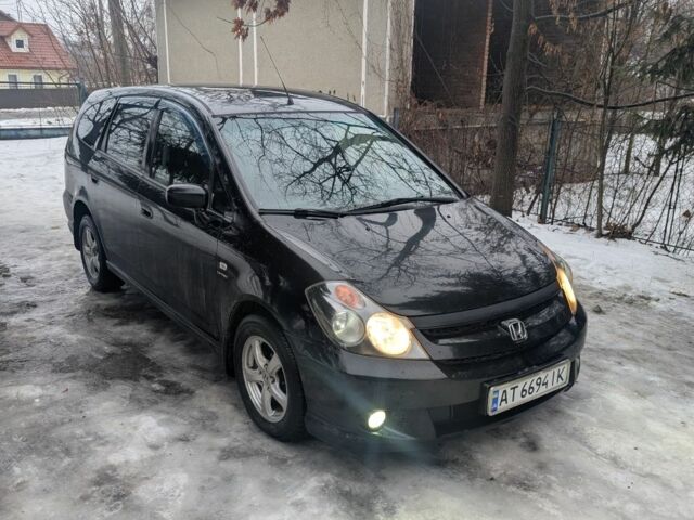 Черный Хонда Стрим, объемом двигателя 2 л и пробегом 360 тыс. км за 5499 $, фото 1 на Automoto.ua
