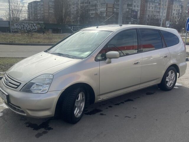 Желтый Хонда Стрим, объемом двигателя 2 л и пробегом 321 тыс. км за 3500 $, фото 1 на Automoto.ua