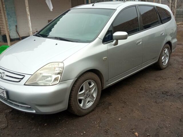 Сірий Хонда Стрім, об'ємом двигуна 2 л та пробігом 243 тис. км за 3700 $, фото 1 на Automoto.ua