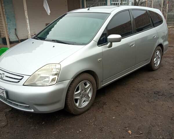 Серый Хонда Стрим, объемом двигателя 2 л и пробегом 240 тыс. км за 4350 $, фото 1 на Automoto.ua