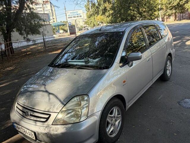 Сірий Хонда Стрім, об'ємом двигуна 2 л та пробігом 300 тис. км за 4511 $, фото 1 на Automoto.ua