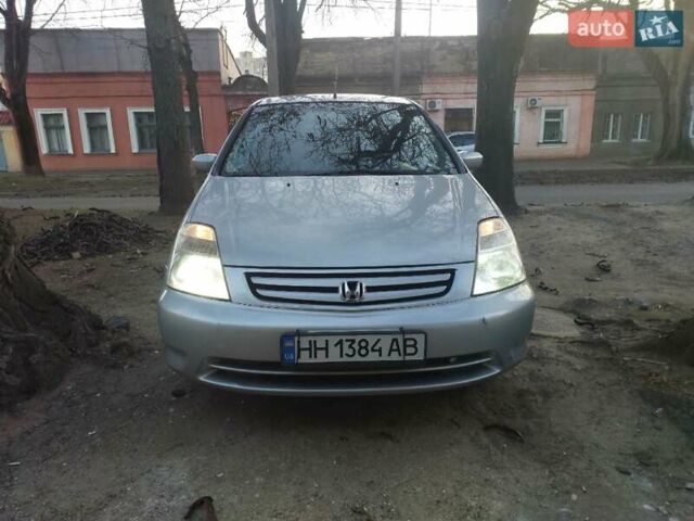 Серый Хонда Стрим, объемом двигателя 2 л и пробегом 319 тыс. км за 4000 $, фото 1 на Automoto.ua