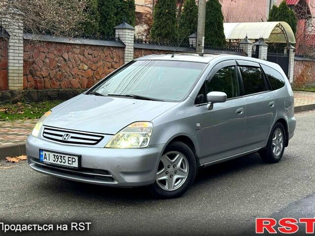 Серый Хонда Стрим, объемом двигателя 2 л и пробегом 259 тыс. км за 5500 $, фото 1 на Automoto.ua
