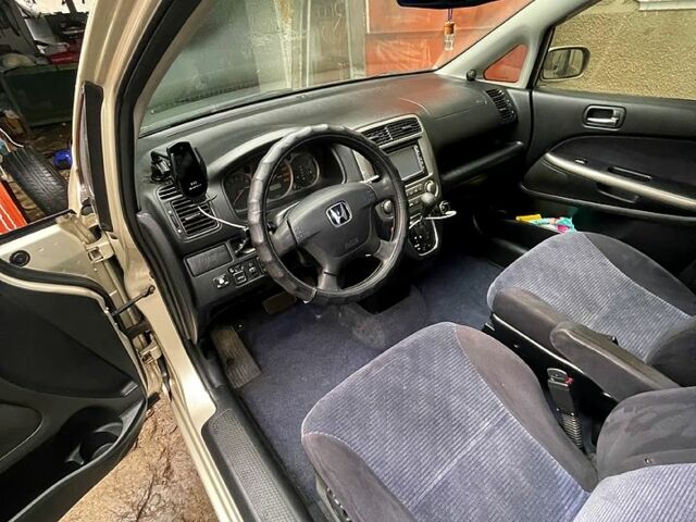 Серый Хонда Стрим, объемом двигателя 2 л и пробегом 270 тыс. км за 4900 $, фото 1 на Automoto.ua