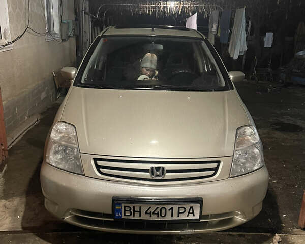 Серый Хонда Стрим, объемом двигателя 2 л и пробегом 280 тыс. км за 4900 $, фото 1 на Automoto.ua