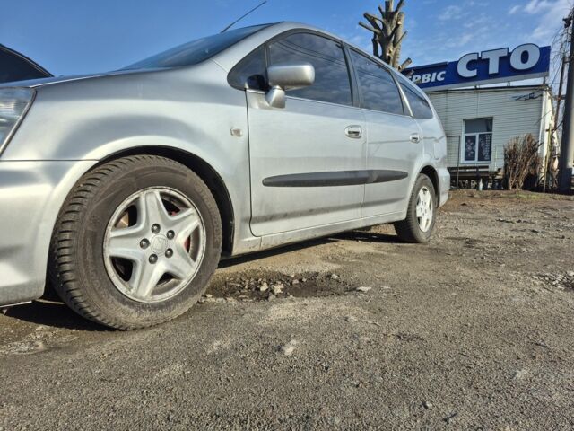 Серый Хонда Стрим, объемом двигателя 2 л и пробегом 490 тыс. км за 4500 $, фото 1 на Automoto.ua