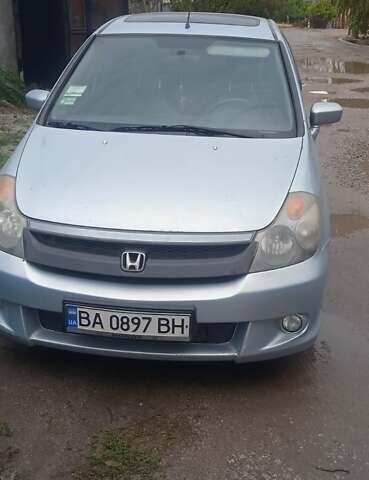 Серый Хонда Стрим, объемом двигателя 2 л и пробегом 213 тыс. км за 4100 $, фото 1 на Automoto.ua