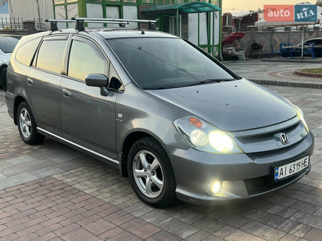 Сірий Хонда Стрім, об'ємом двигуна 2 л та пробігом 399 тис. км за 3999 $, фото 1 на Automoto.ua