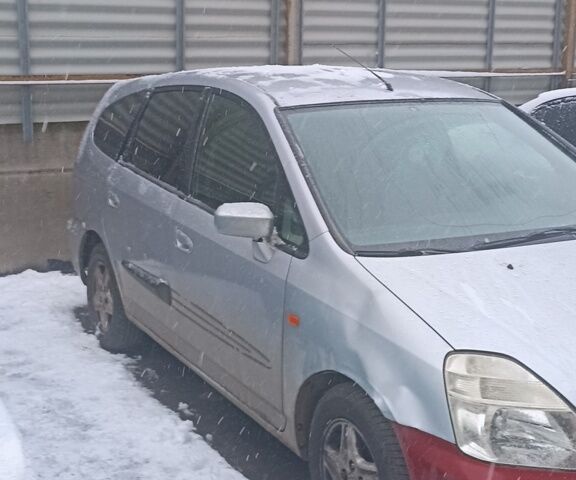 Сірий Хонда Стрім, об'ємом двигуна 2 л та пробігом 340 тис. км за 4300 $, фото 1 на Automoto.ua