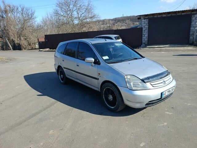 Серый Хонда Стрим, объемом двигателя 2 л и пробегом 456 тыс. км за 3500 $, фото 1 на Automoto.ua