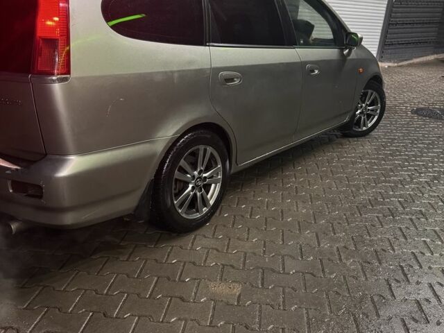 Сірий Хонда Стрім, об'ємом двигуна 2 л та пробігом 3 тис. км за 3000 $, фото 1 на Automoto.ua