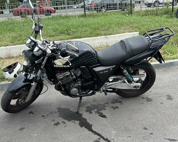 Черный Хонда CB 400SF, объемом двигателя 0.4 л и пробегом 56 тыс. км за 3100 $, фото 1 на Automoto.ua