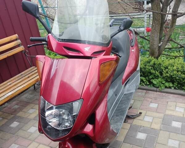 Красный Хонда Foresight 250, объемом двигателя 0.25 л и пробегом 63 тыс. км за 1000 $, фото 1 на Automoto.ua