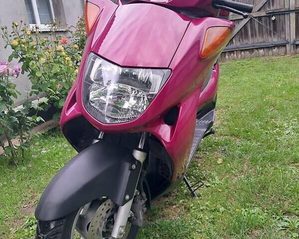 Красный Хонда Foresight 250, объемом двигателя 0.25 л и пробегом 32 тыс. км за 958 $, фото 1 на Automoto.ua