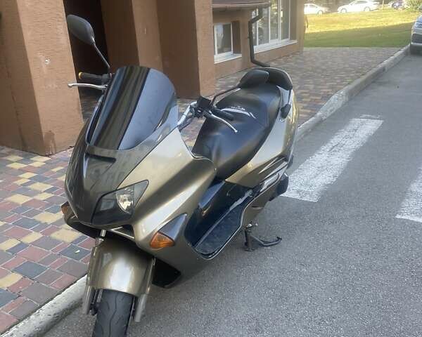 Серый Хонда Forza MF06, объемом двигателя 0.25 л и пробегом 37 тыс. км за 1700 $, фото 1 на Automoto.ua