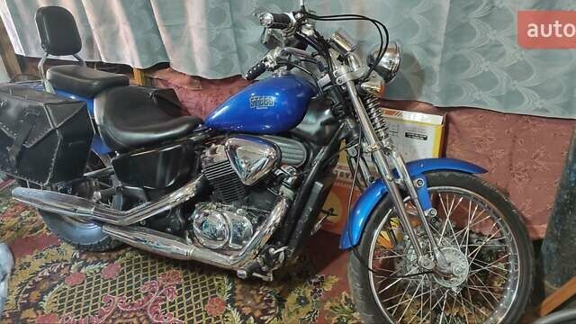 Синий Хонда Steed 400 VLX, объемом двигателя 0.4 л и пробегом 57 тыс. км за 3100 $, фото 1 на Automoto.ua