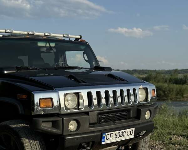 Черный Хаммер Н2, объемом двигателя 5.96 л и пробегом 48 тыс. км за 49999 $, фото 1 на Automoto.ua