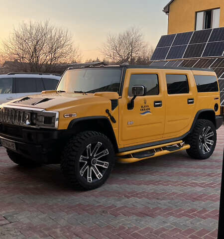 Жовтий Хаммер Н2, об'ємом двигуна 5.96 л та пробігом 175 тис. км за 26500 $, фото 1 на Automoto.ua