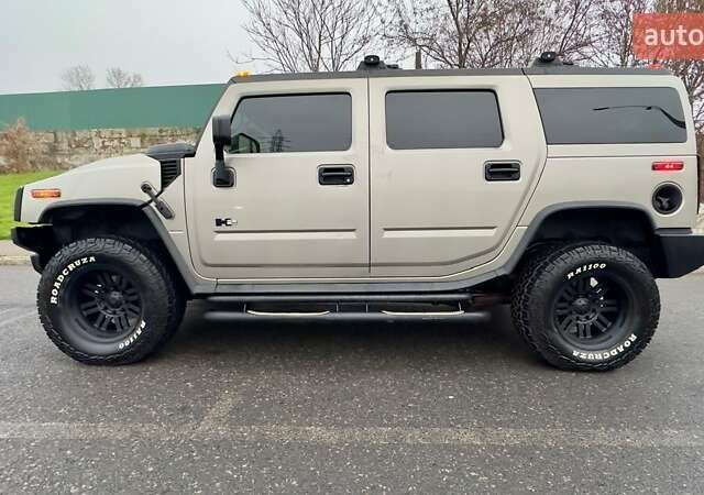 Сірий Хаммер Н2, об'ємом двигуна 5.97 л та пробігом 125 тис. км за 28000 $, фото 1 на Automoto.ua