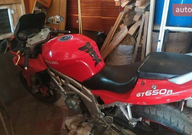 Красный Хьюсонг GT 650R, объемом двигателя 0.65 л и пробегом 60 тыс. км за 1400 $, фото 1 на Automoto.ua