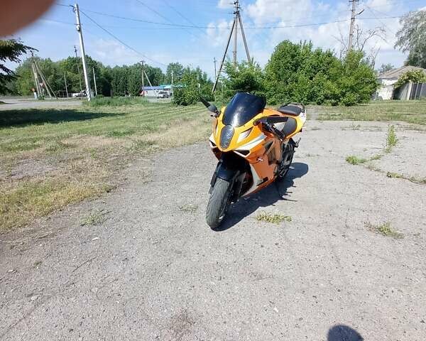 Оранжевый Хьюсонг GT 650R, объемом двигателя 0.65 л и пробегом 37 тыс. км за 3100 $, фото 1 на Automoto.ua