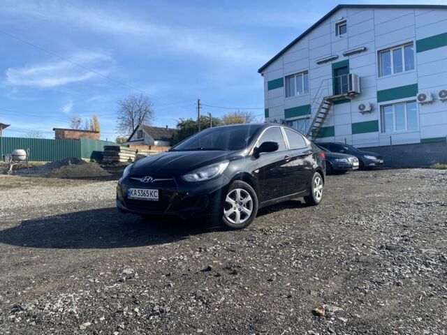 Черный Хендай Акцент, объемом двигателя 1.4 л и пробегом 213 тыс. км за 6250 $, фото 1 на Automoto.ua