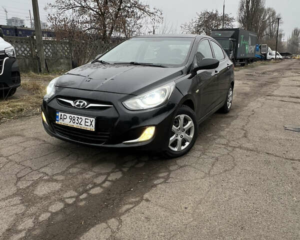 Черный Хендай Акцент, объемом двигателя 1.4 л и пробегом 230 тыс. км за 4900 $, фото 1 на Automoto.ua