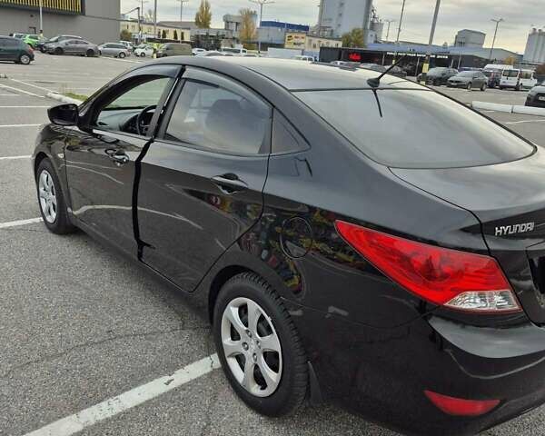 Черный Хендай Акцент, объемом двигателя 1.4 л и пробегом 177 тыс. км за 9200 $, фото 1 на Automoto.ua