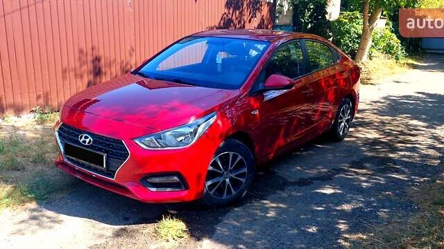 Красный Хендай Акцент, объемом двигателя 1.37 л и пробегом 144 тыс. км за 9600 $, фото 1 на Automoto.ua