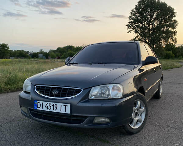 Серый Хендай Акцент, объемом двигателя 1.34 л и пробегом 306 тыс. км за 2635 $, фото 1 на Automoto.ua