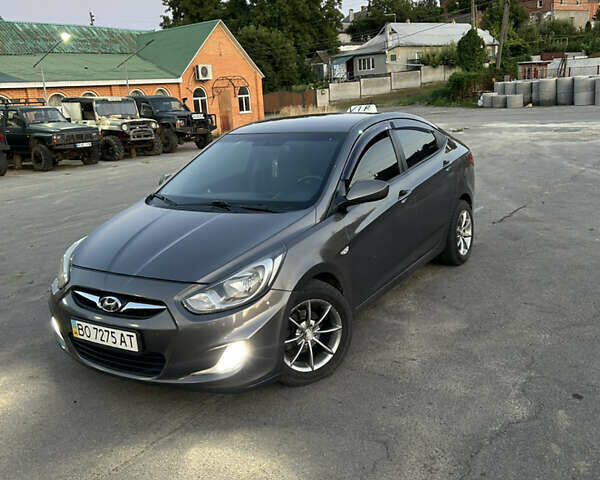 Серый Хендай Акцент, объемом двигателя 1.4 л и пробегом 187 тыс. км за 5800 $, фото 1 на Automoto.ua