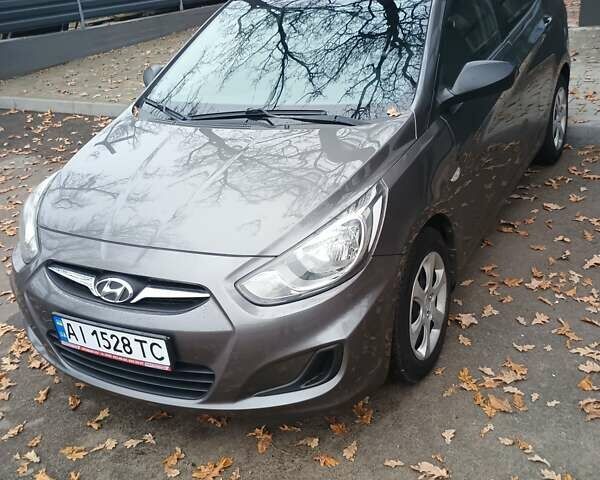 Серый Хендай Акцент, объемом двигателя 1.4 л и пробегом 128 тыс. км за 7150 $, фото 1 на Automoto.ua