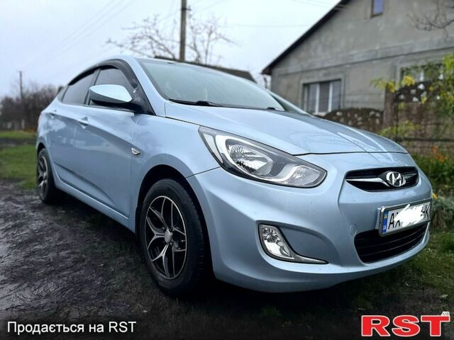 Серый Хендай Акцент, объемом двигателя 1.4 л и пробегом 127 тыс. км за 9000 $, фото 1 на Automoto.ua