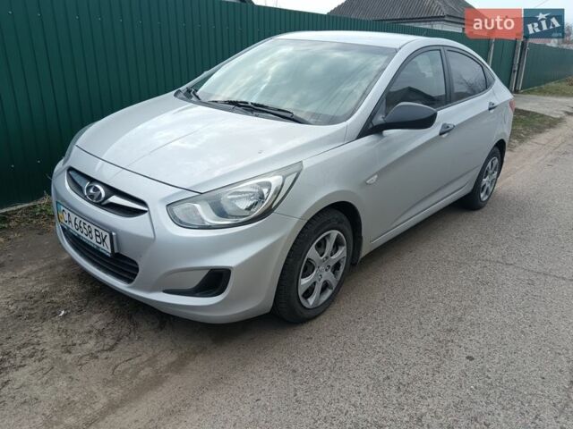 Серый Хендай Акцент, объемом двигателя 1.4 л и пробегом 132 тыс. км за 6550 $, фото 1 на Automoto.ua