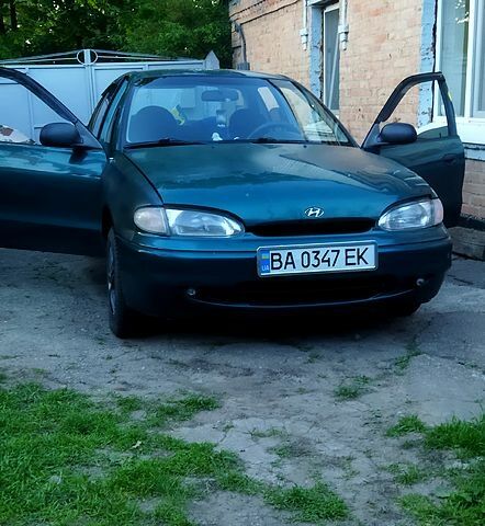 Зеленый Хендай Акцент, объемом двигателя 1.5 л и пробегом 210 тыс. км за 1500 $, фото 1 на Automoto.ua