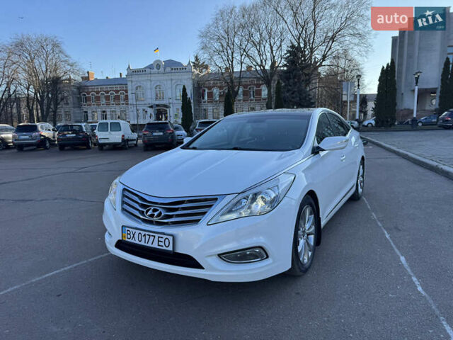 Белый Хендай Азера, объемом двигателя 3 л и пробегом 178 тыс. км за 9899 $, фото 1 на Automoto.ua