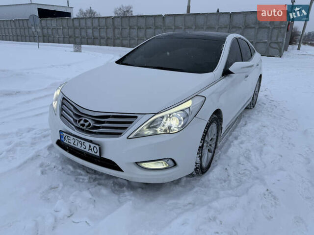 Белый Хендай Азера, объемом двигателя 3 л и пробегом 106 тыс. км за 12800 $, фото 1 на Automoto.ua
