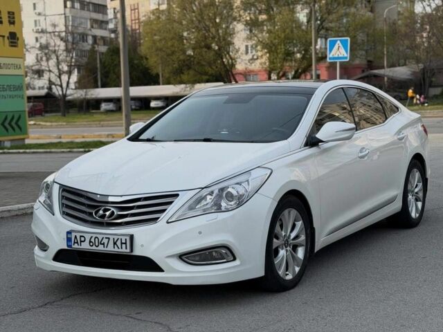 Белый Хендай Азера, объемом двигателя 3 л и пробегом 148 тыс. км за 9900 $, фото 1 на Automoto.ua