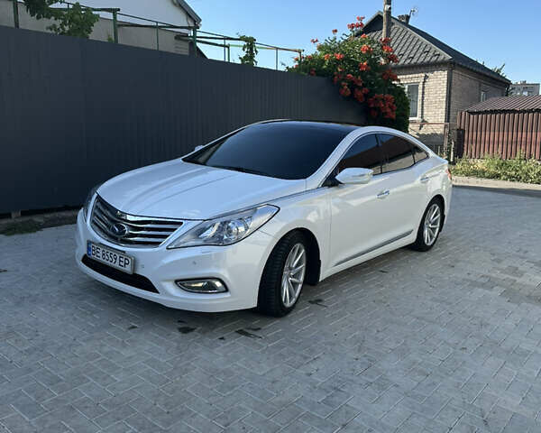 Белый Хендай Азера, объемом двигателя 3 л и пробегом 116 тыс. км за 12500 $, фото 1 на Automoto.ua