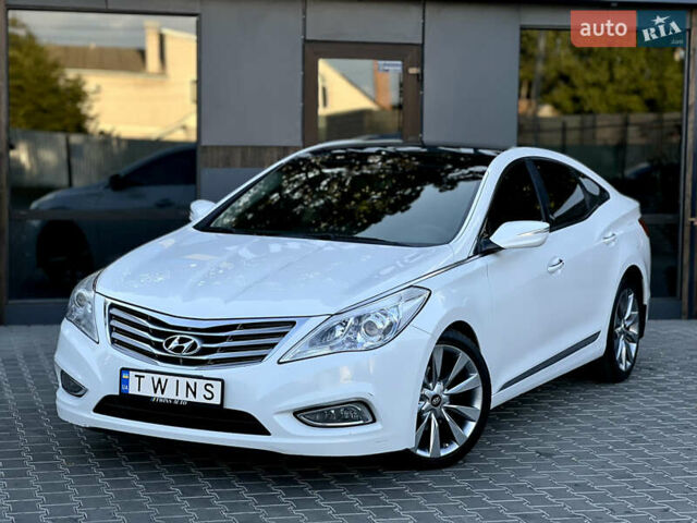 Белый Хендай Азера, объемом двигателя 3 л и пробегом 153 тыс. км за 10900 $, фото 1 на Automoto.ua