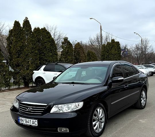 Черный Хендай Азера, объемом двигателя 3.3 л и пробегом 241 тыс. км за 5500 $, фото 1 на Automoto.ua