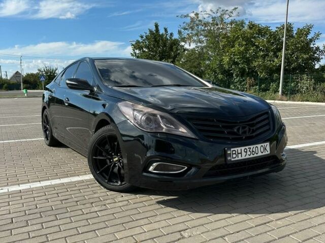 Черный Хендай Азера, объемом двигателя 3 л и пробегом 179 тыс. км за 7502 $, фото 1 на Automoto.ua