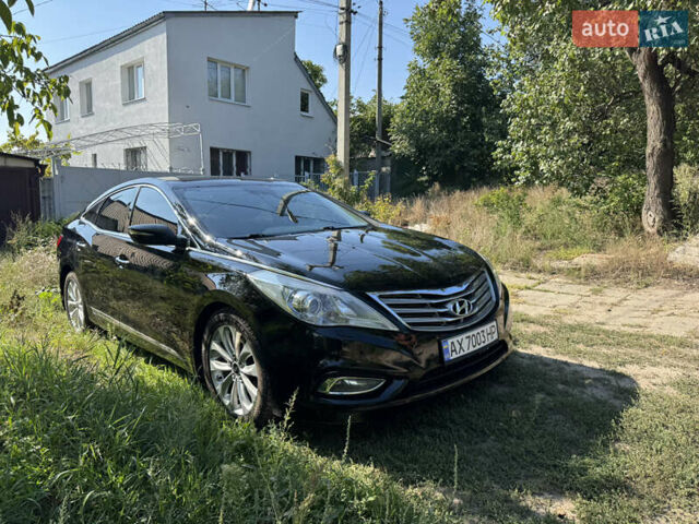 Черный Хендай Азера, объемом двигателя 3 л и пробегом 181 тыс. км за 12200 $, фото 1 на Automoto.ua
