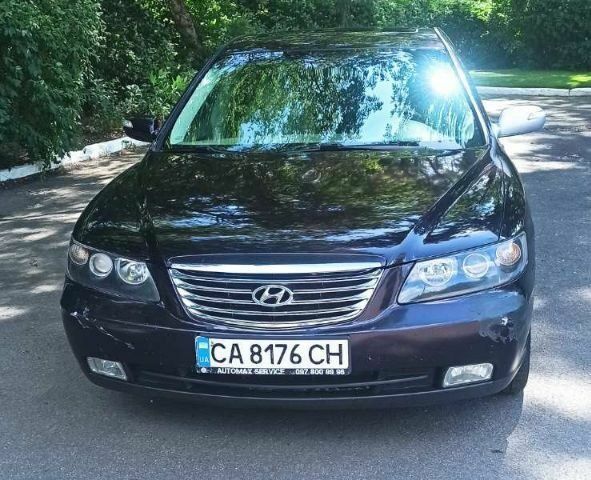 Червоний Хендай Азера, об'ємом двигуна 3.3 л та пробігом 200 тис. км за 5798 $, фото 1 на Automoto.ua