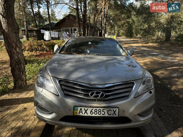 Серый Хендай Азера, объемом двигателя 3 л и пробегом 215 тыс. км за 7063 $, фото 1 на Automoto.ua