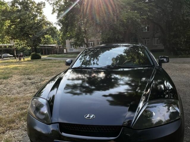 Черный Хендай Купе, объемом двигателя 2 л и пробегом 110 тыс. км за 5500 $, фото 1 на Automoto.ua